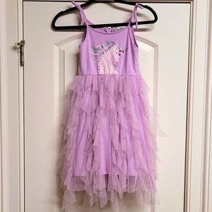 Fun, purple unicorn dress with spaghetti straps. Size 6x Great condition.